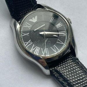 Emporium Armani watch dial glass is scratched but can easily be repaired